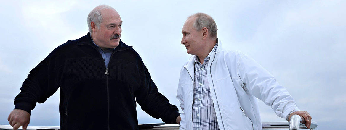 Russian President Vladimir Putin chats with Belarus President Alexander Lukashenko, left, during a yacht trip on the Black Sea, 29 May, 2021 in Sochi, Russia.