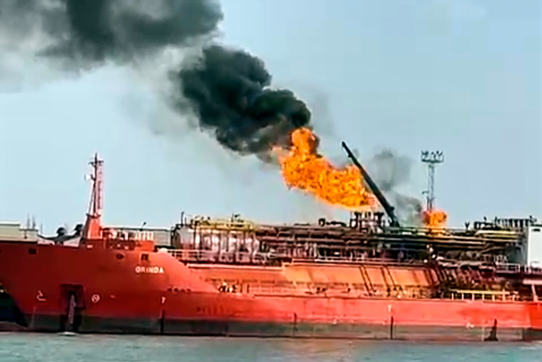 A cargo ship loaded with liquified petroleum gas engulfed by flames following Russian strikes