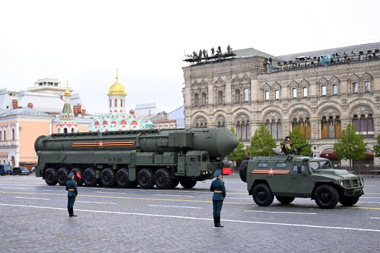 A RS-24 Yars intercontinental ballistic missile system (L) and a Tigr-M all-terrain infantry mobility vehicle (R) drive on Red Square during the Victory Day military parade in central Moscow on May 9, 2024. Russia celebrates the 79th anniversary of the victory over Nazi Germany in World War II. (Photo by NATALIA KOLESNIKOVA / AFP) (Photo by NATALIA KOLESNIKOVA/AFP via Getty Images)