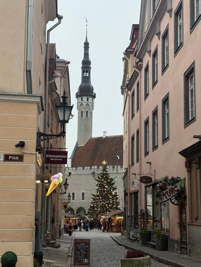 A street in Tallinn, which shows the Christmas market at the end