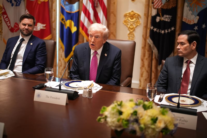 WASHINGTON, DC - OCTOBER 17: U.S. Vice President JD Vance (L) and U.S. Secretary of State Marco Rubio (R) look on as U.S. President Donald Trump speaks during a lunch meeting with Ukrainian President Volodymyr Zelensky at the White House on October 17, 2025, in Washington, DC. President Trump, fresh off a ceasefire agreement between Israel and Hamas, is hosting President Zelensky for a bilateral lunch in the Cabinet Room in hopes of advancing a peace deal between Russia and Ukraine. (Photo by Andrew Harnik/Getty Images)
