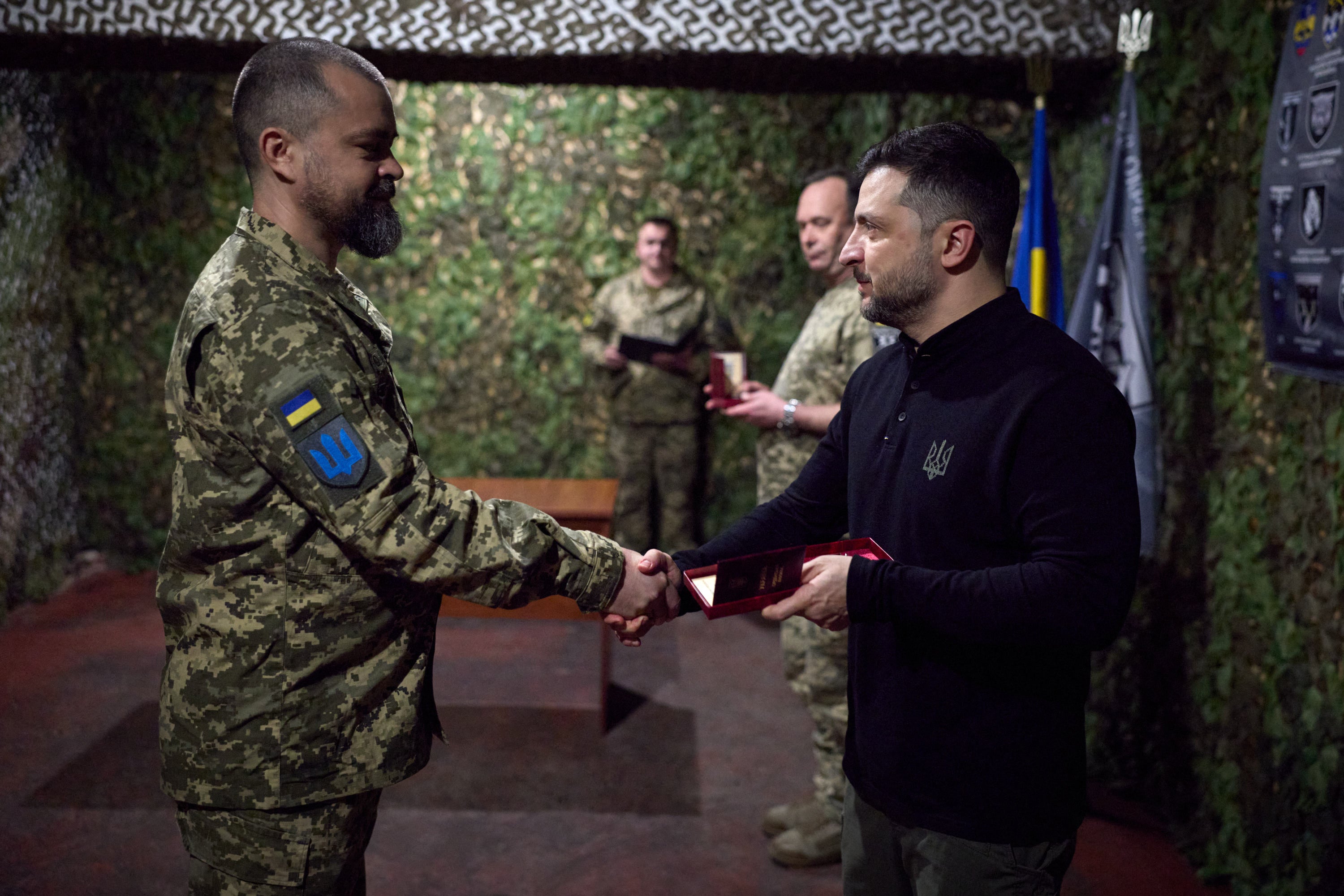Ukrainian president Volodymyr Zelensky ordering a serviceman during his visit in 65th Separate Motorised Brigade in Zaporizhzhia region, amid Russian invasion in Ukraine