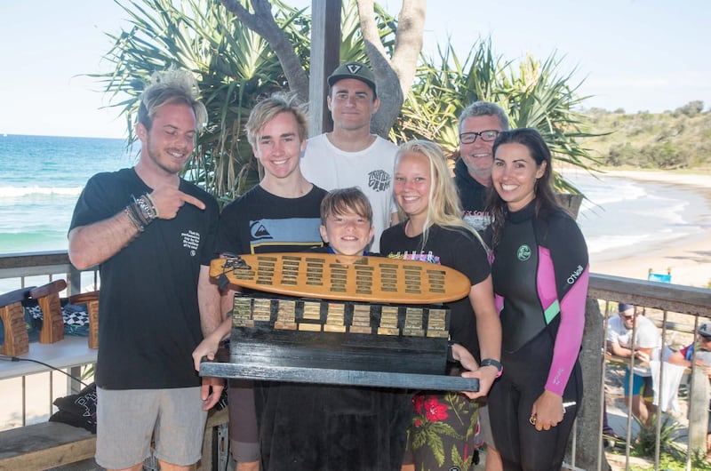 Coffs Soul Surfest participants smile with a trophy during the 2016 Surfest in Coffs Harbour, Australia, September 2016.