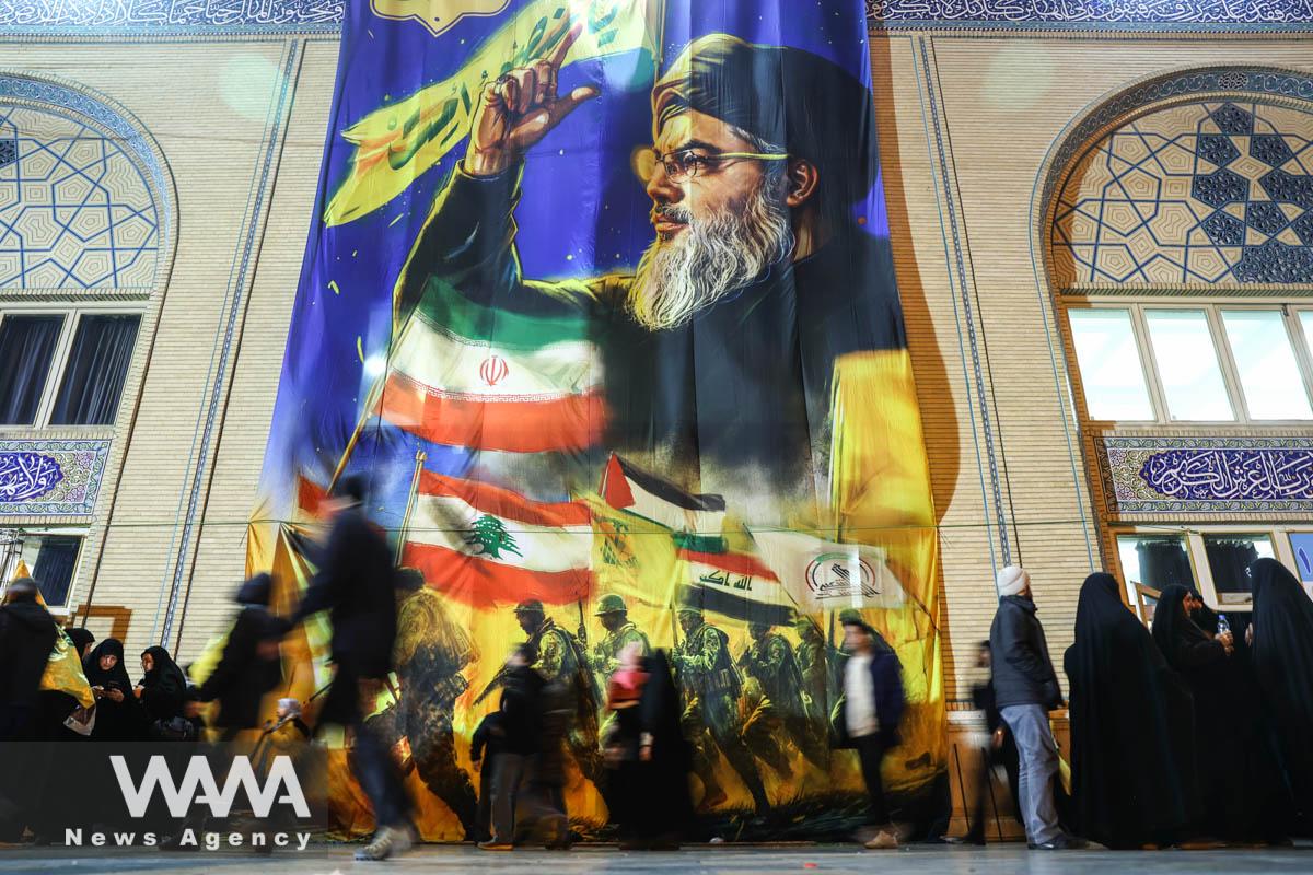 A billboard with a picture of late Lebanon's Hezbollah leader Sayyed Hassan Nasrallah is displayed during a mourning ceremony for late Hezbollah leaders Hassan Nasrallah and Hashem Safieddine, who were killed in Israeli airstrikes last year