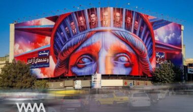 Tehran’s Enghelab Square's new mural titled “Behind the Promises of Freedom”