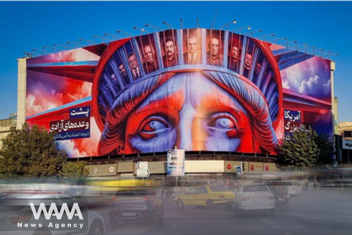 Tehran’s Enghelab Square's new mural titled “Behind the Promises of Freedom”