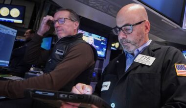 Wall Street swings through another unsettled day ahead of a crucial couple of tests