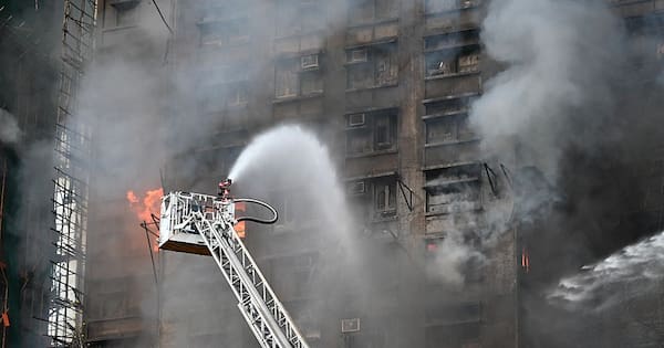 Fire that killed at least 44 burns in Hong Kong towers for second day