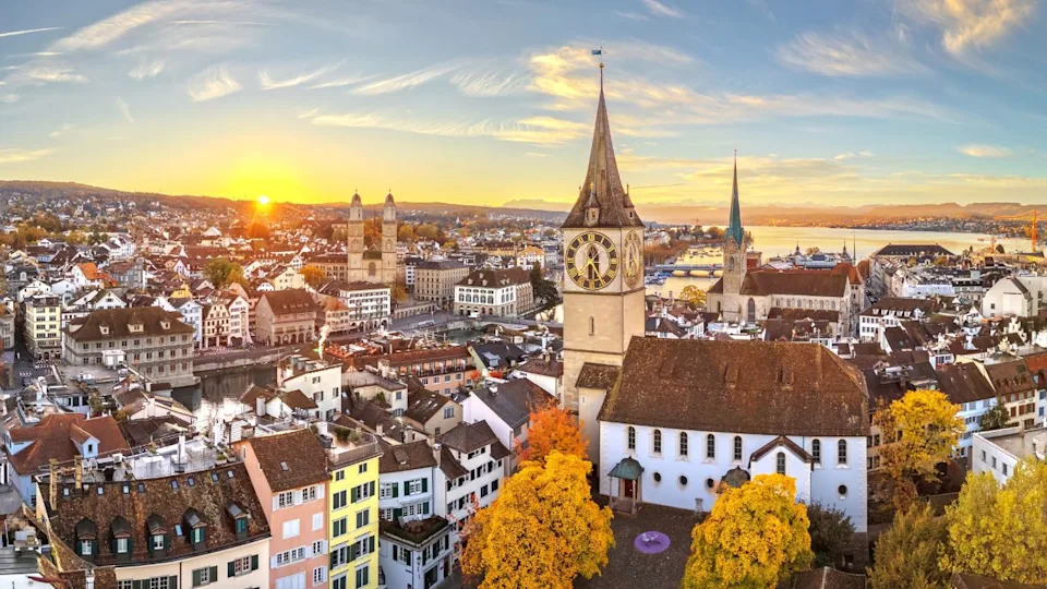 Zurich, Switzerland old town skyline over the Limmat River on an autumn morning.