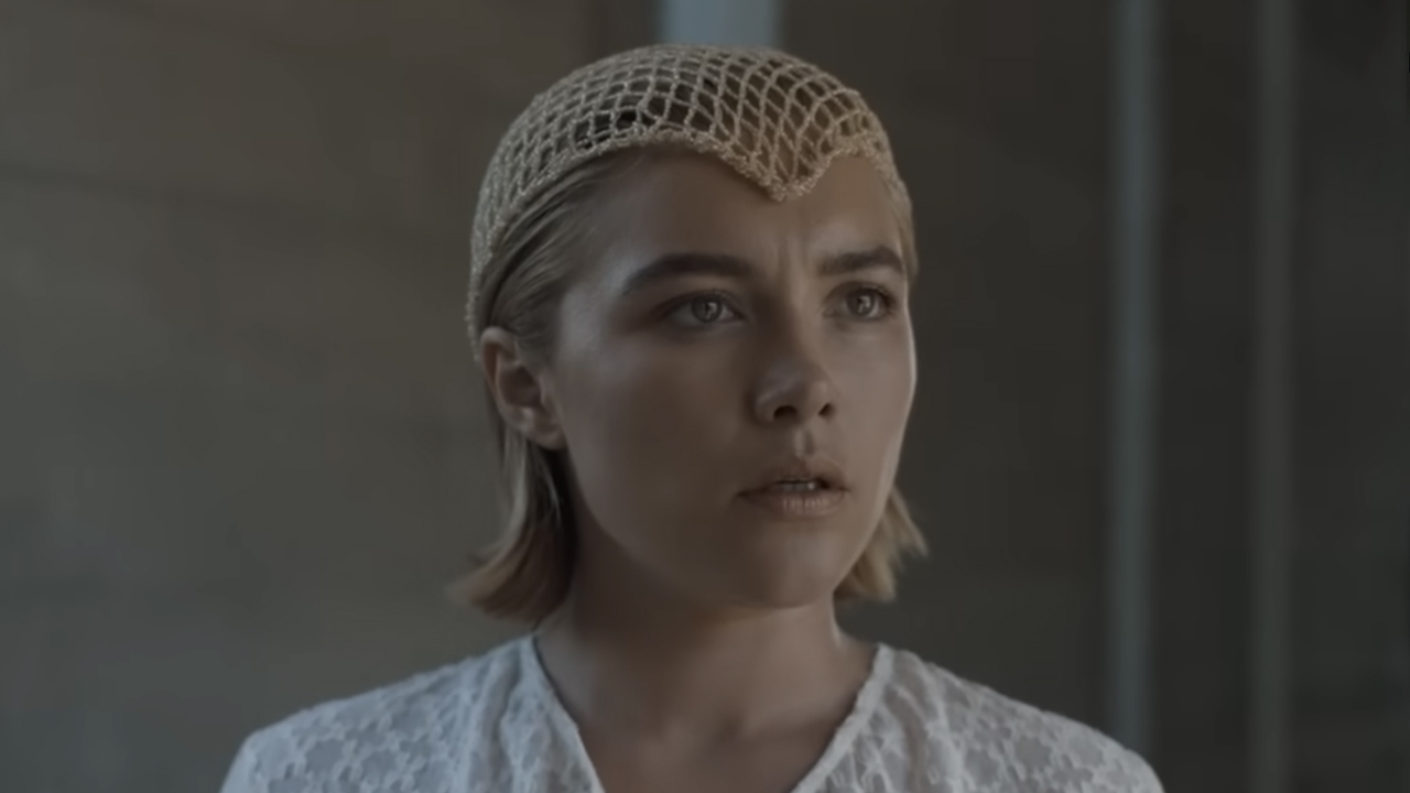Florence Pugh, in all white and head piece as Princess Irulan in Dune: Part 2.