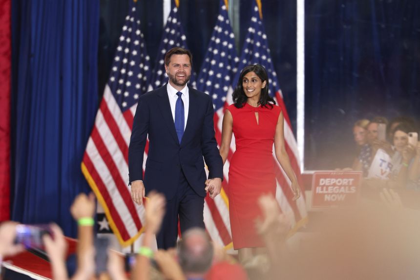 Then Republican vice presidential candidate JD Vance and his wife Usha Vance arrive at a campaign rally, July 27, 2024, in St. Cloud, Minnesota.