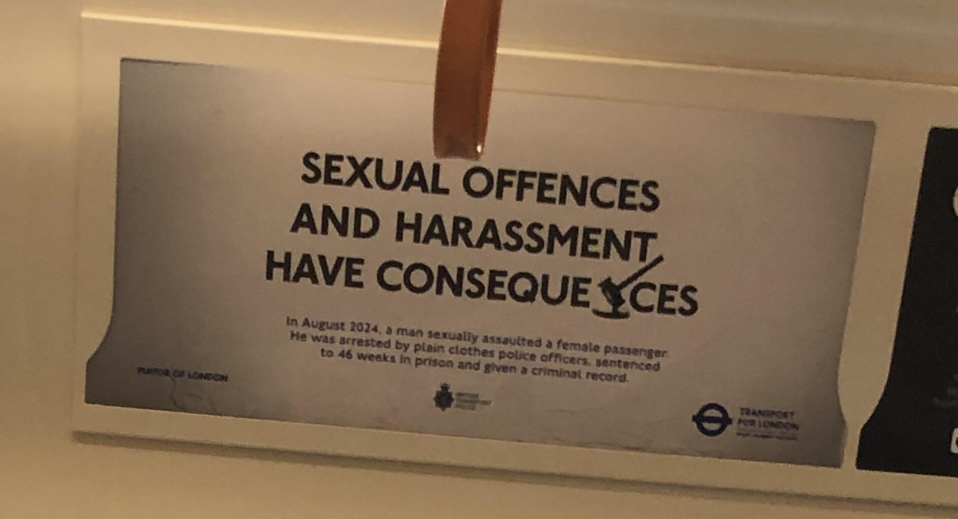 Tube poster. How is a gavel an ‘N’?