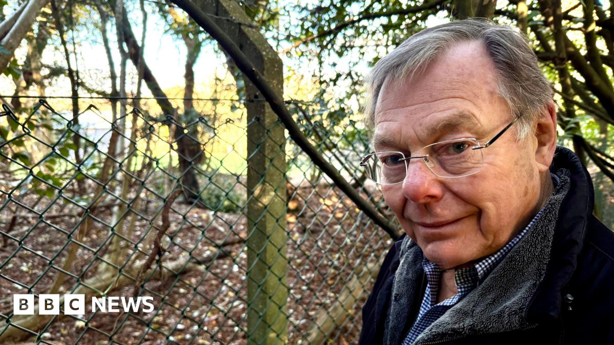 Family having a moment together messing about while winter sea swimming