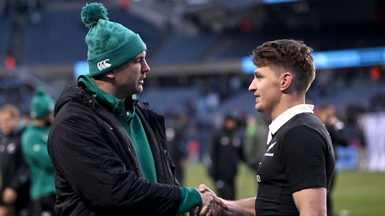 Beauden Barrett shakes hands with red-carded lock Tadhg Beirne after the Test at Soldier Field.