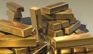 Gold Prices Drop For Third Week As Dollar Gains; Fed Remarks Curb Safe-Haven Buying