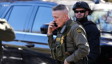 U.S. Border Patrol Commander Gregory Bovino takes a phone call Monday, Nov. 17, 2025, in Charlotte, N.C. (AP Photo/Matt Kelley)
