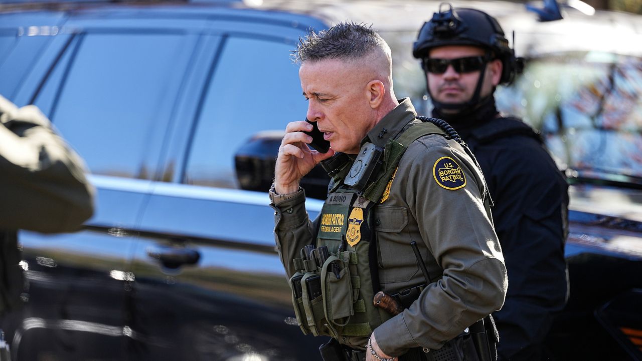 U.S. Border Patrol Commander Gregory Bovino takes a phone call Monday, Nov. 17, 2025, in Charlotte, N.C. (AP Photo/Matt Kelley)