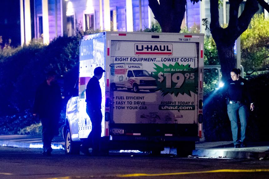 fficers examine a U-Haul involved in a shooting at the Coast Guard Base in Alameda, California, on October 24.