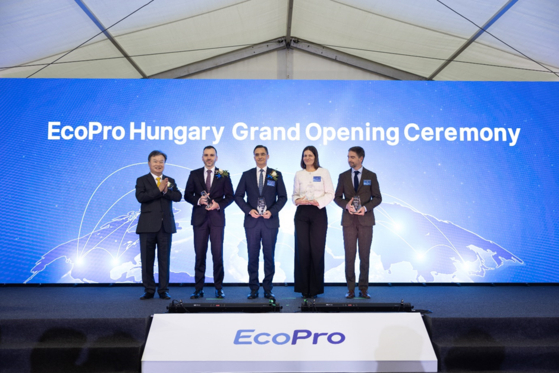 Officials from EcoPro and the Hungarian Investment Promotion Agency pose for photos during the celebratory ceremony held for the company's construction of its cathode material plant in Debrecen, Hungary, on Nov. 28. [ECOPRO]