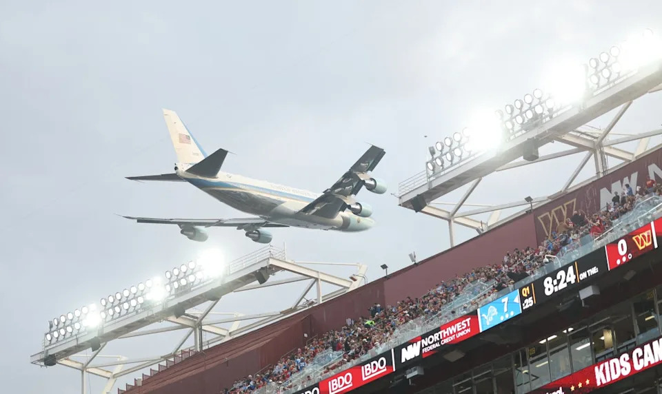 Air Force One flies low over Northwest Stadium during the game between the Washington Commanders and the Detroit Lions. (IMAGN IMAGES via Reuters Connect)