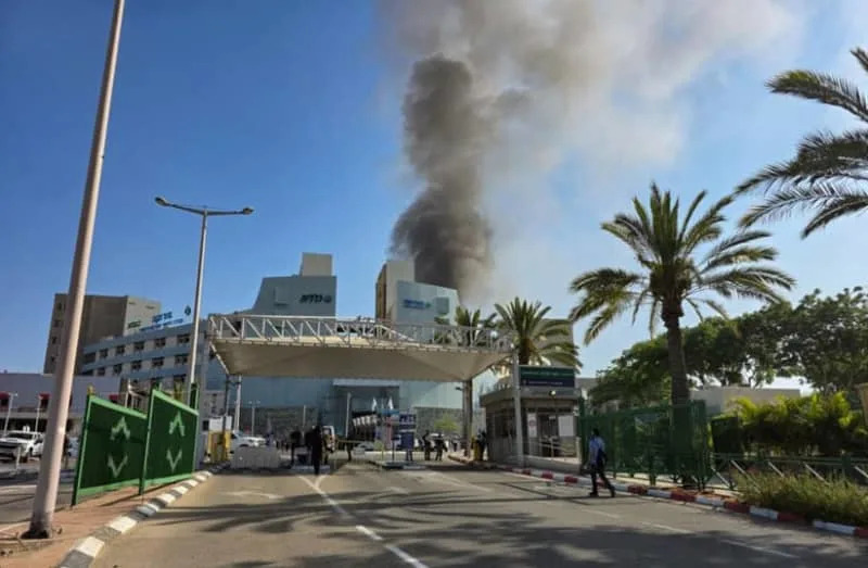 Smoke rises from the scene where a ballistic missile fired from Iran hit and caused damage at the Soroka Medical Center in Be'er Sheva, June 19, 2025. (credit: DUDU GREENSPAN/FLASH90)