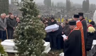 The father of one of the children killed in Ternopil rocks their coffin before burial. He lost his wife and both children in the attack - November 2025