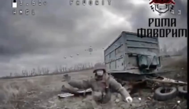Russian  soldier trying to fight of Ukrainian drone using various nearby objects. Donetsk  region