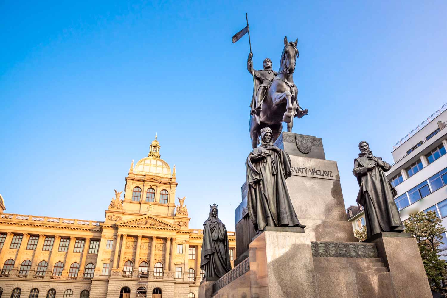 View of the National Museum in Prague, seen behind the statue of King Wenceslas in Wenceslas Square - one of the great museums to visit in Prague with kids