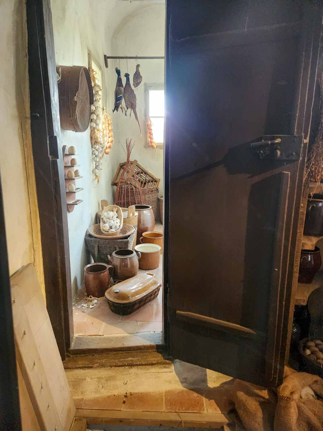 View of a pantry inside one of the buildings on Golden Lane inside the Prague Castle complex, one of the best places to visit in Prague with kids