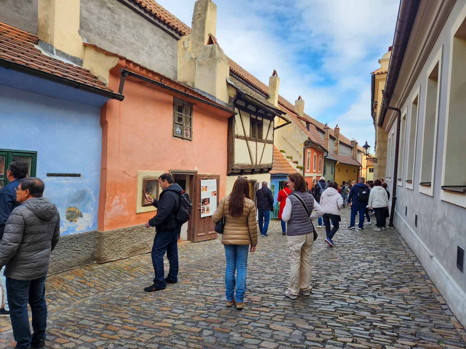 Cobbled street and colourful buildings of Golden Lane inside the Prague Castle complex, one of the best places to visit in Prague with kids