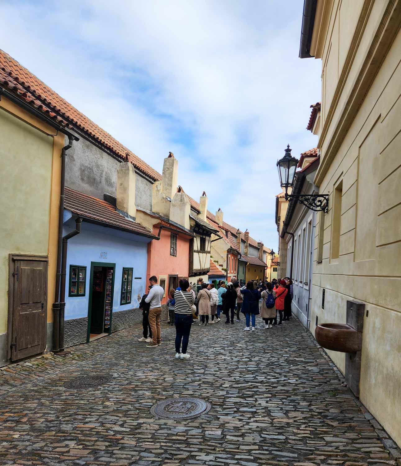 Cobbled street and colourful buildings of Golden Lane inside the Prague Castle complex, one of the best places to visit in Prague with kids