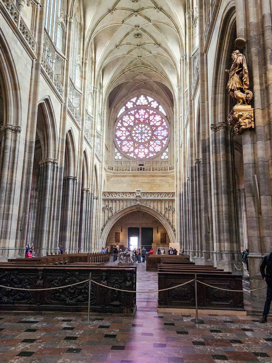 Nave of St Vitus Cathedral with its rose window, set within the Prague Castle complex - one of the sites to see in Prague with kids