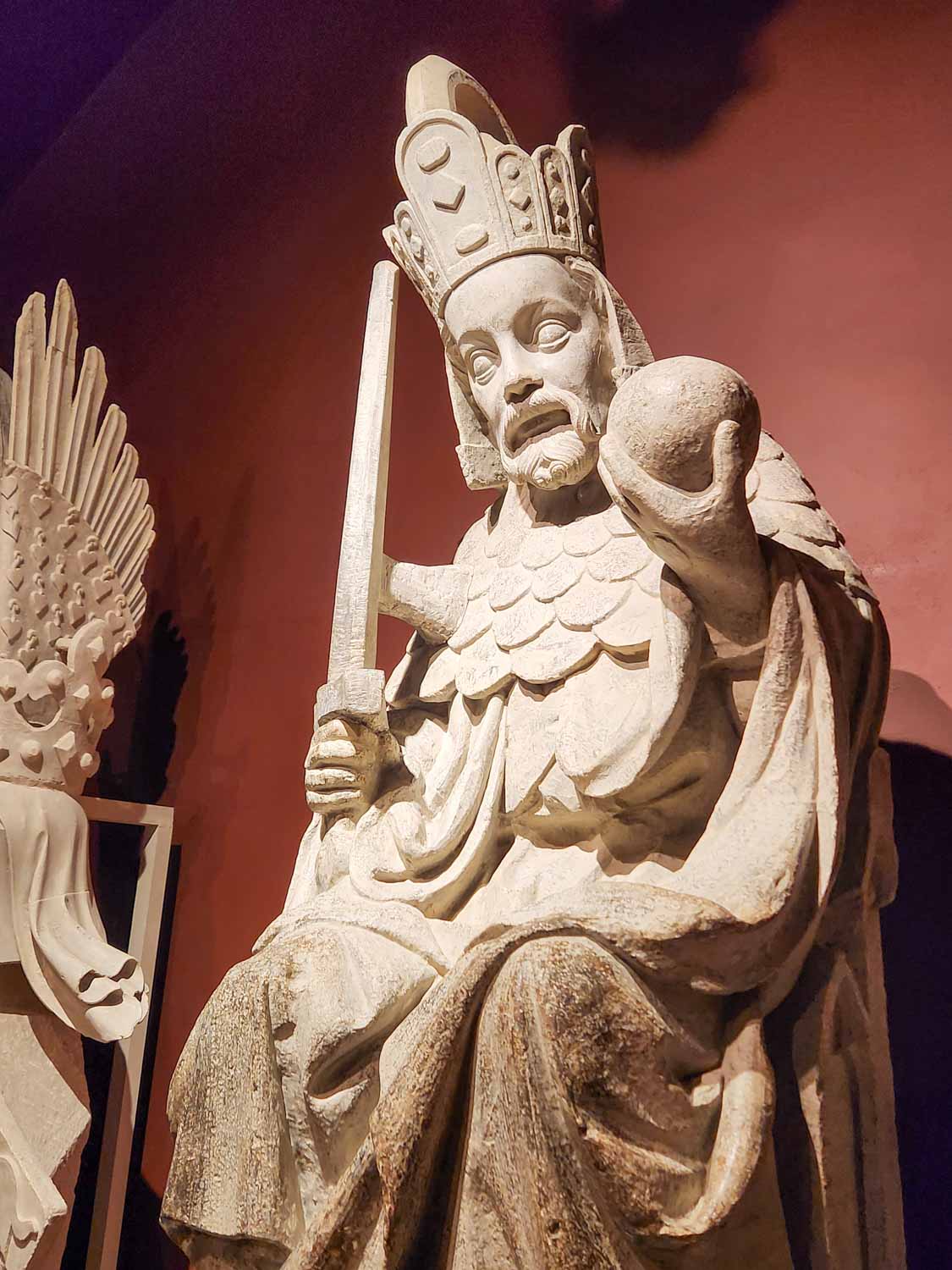 Stone statue in the Charles Bridge Museum by the river - one of the many things to do in Prague with kids