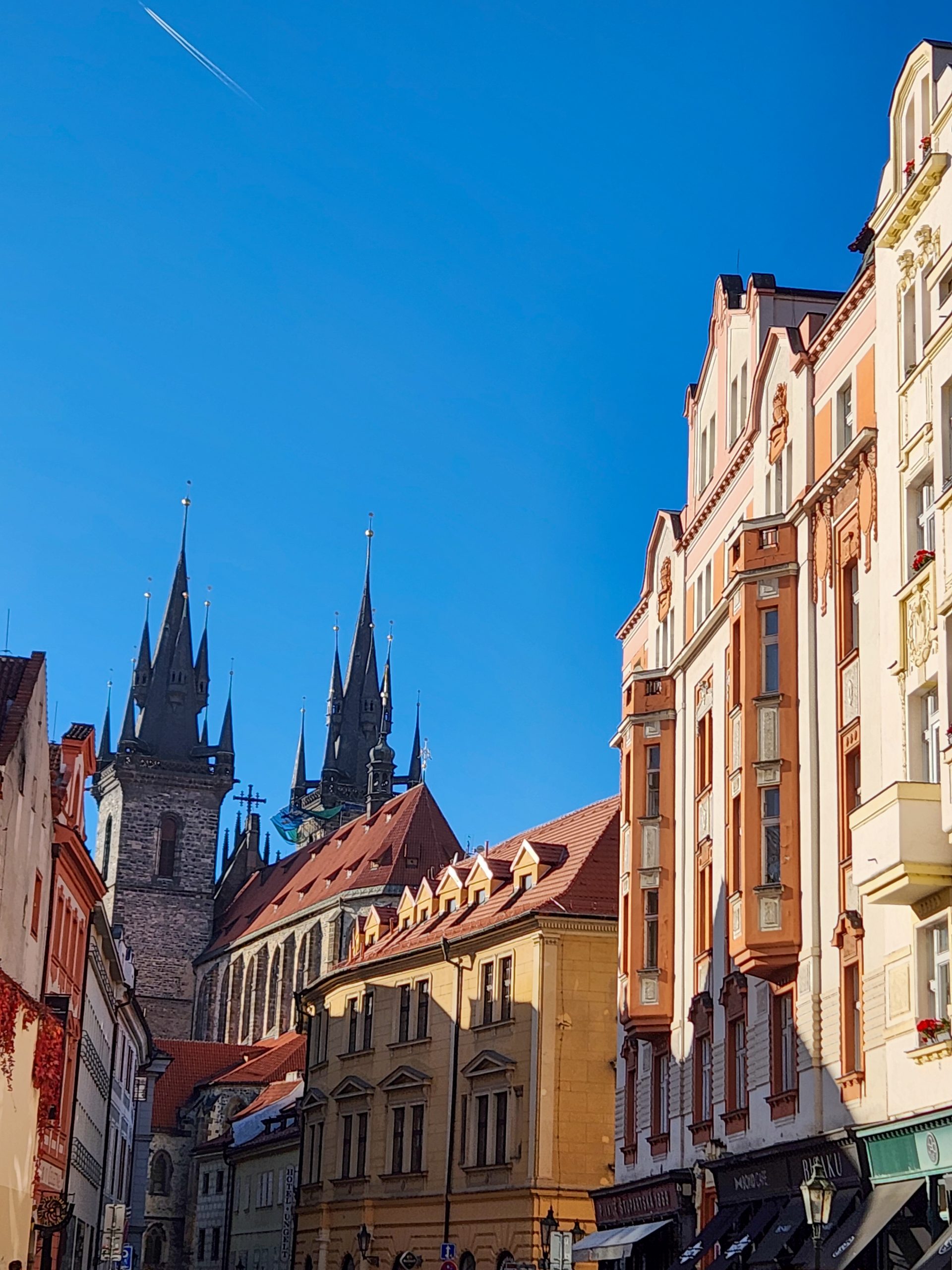 View of colourful buildings in one of the back streets of the Old Town in Prague on a sunny day