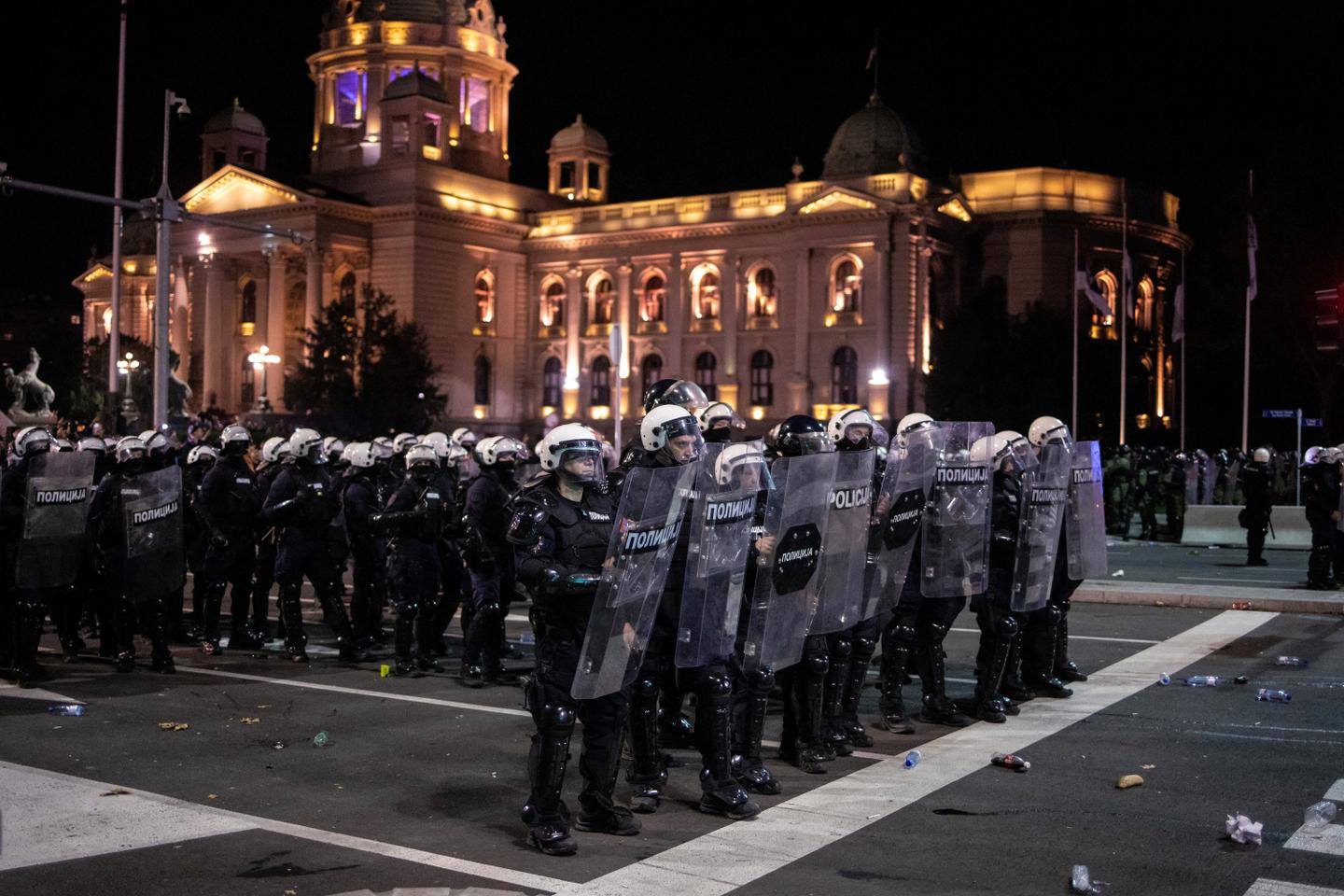 Riot police separate opponents and loyalists of Serbia's president as tensions soar