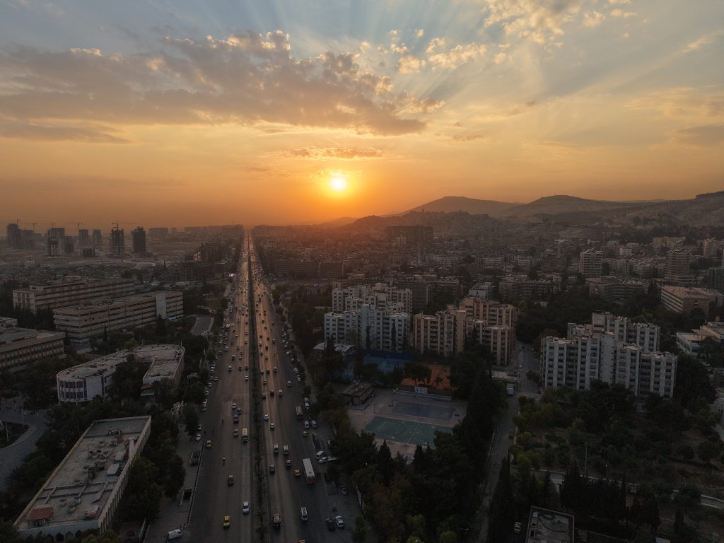 DAMASCUS, SYRIA - NOVEMBER 11: An aerial view shows Mount Qasioun, Sahat al-Umayyine, Sulaymaniyya Takiyya, the General Staff building of the Ministry of Defense, and the Syrian Radio and Television headquarters in Damascus, Syria, on November 11, 2025. Izz Aldien Alqasem / Anadolu (Photo by Izz Aldien Alqasem / Anadolu via AFP)