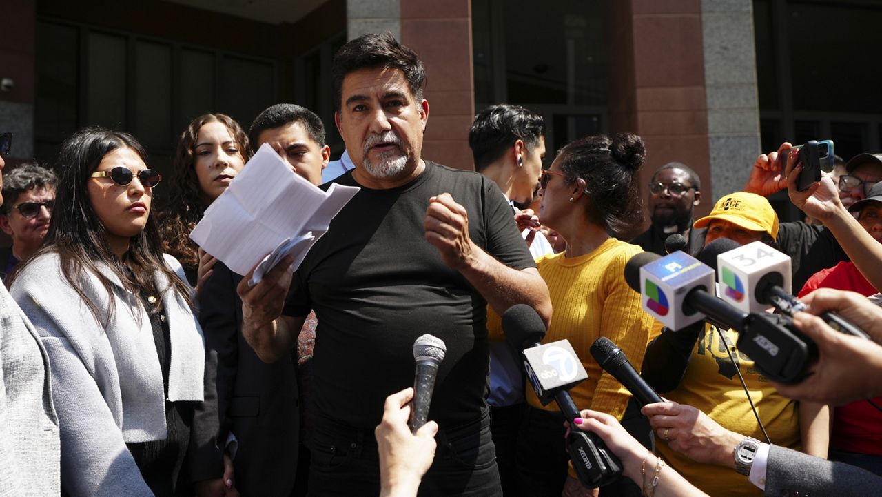 David Huerta, president of the Service Employees International Union (SEIU) California, who was arrested during an immigration raid last week, speaks after he was released on a bond in downtown Los Angeles, Monday, June 9, 2025. (AP Photo/Damian Dovarganes)