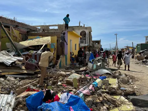 Brandon Drenon / BBC Residents of Whitehouse in Westmoreland Parish try to piece their lives back together