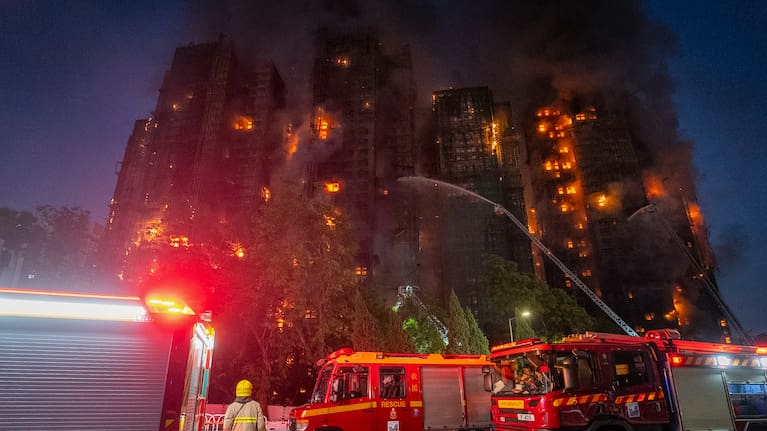 Firefighters work to extinguisha fire that broke out at Wang Fuk Court, a residential estate in the Tai Po district of Hong Kong's New Territories.