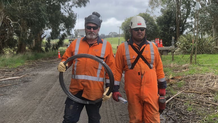 Fred Allan and Josidy Tallada are some of the workers improving the outlook for those still without power in Southland.