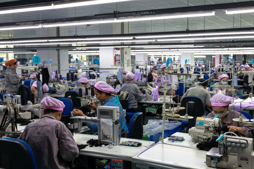 Employees work at a factory in China's Guizhou province last month.
