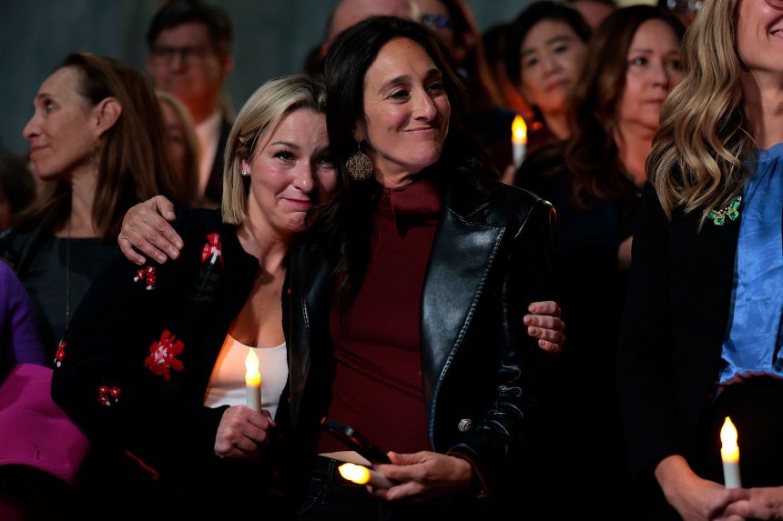 Epstein abuse survivor Danielle Bensky, and National Director of World Without Exploitation Lauren Hersh embrace after receiving word that the US Senate unanimously approved passage of the House's Epstein Files Transparency Act on Capitol Hill on Tuesday, in Washington, DC.