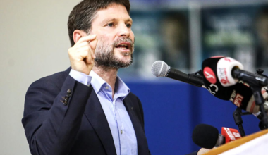Bezalel Smotrich, a far-right Israeli lawmaker and leader of the Religious Zionism party, speaks during a rally with supporters in the southern Israeli city of Sderot, 26 October 2022 (AFP)