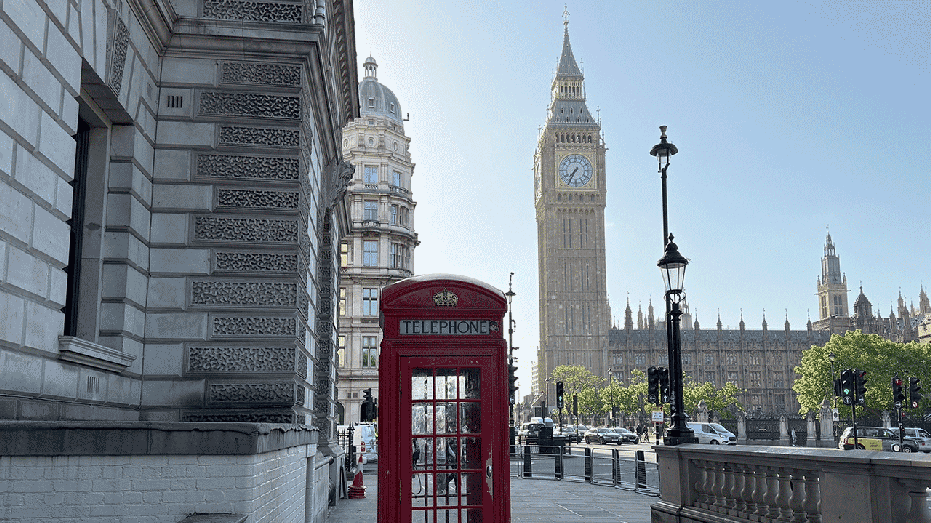 22 May 2025, Great Britain, London: A red telephone box stands in front of the clock tower with Big Ben. Photo: Julia Kilian/dpa (Photo by Julia Kilian/picture alliance via Getty Images)