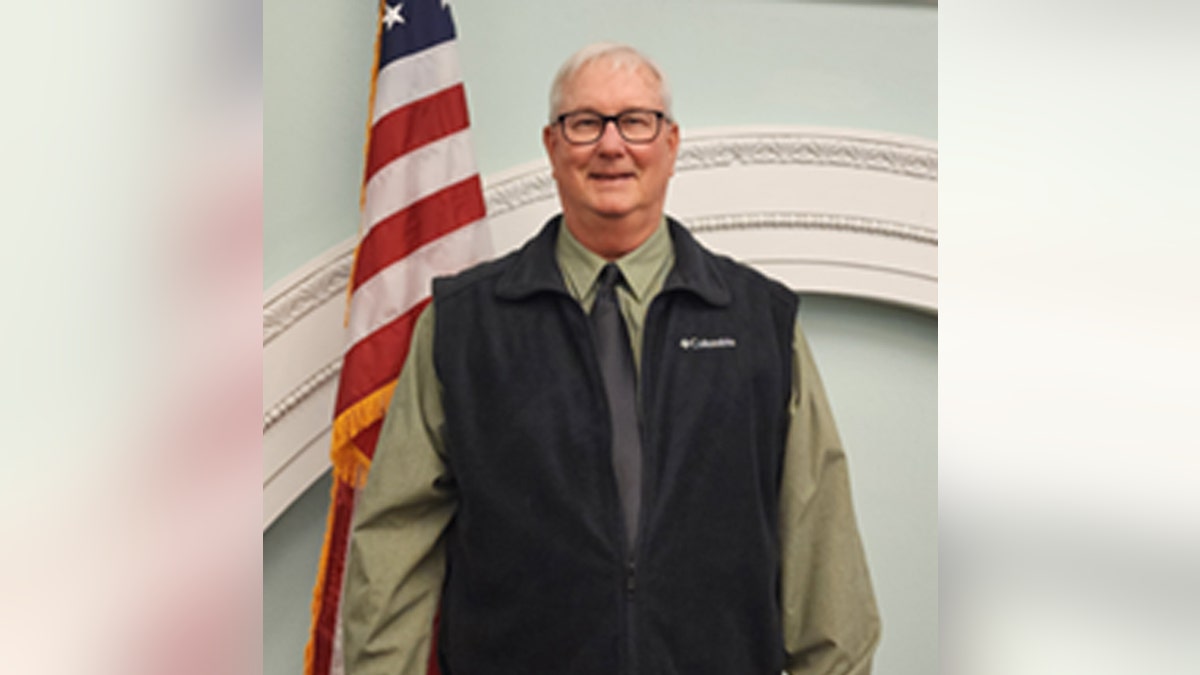 Michael Clayton poses for a picture