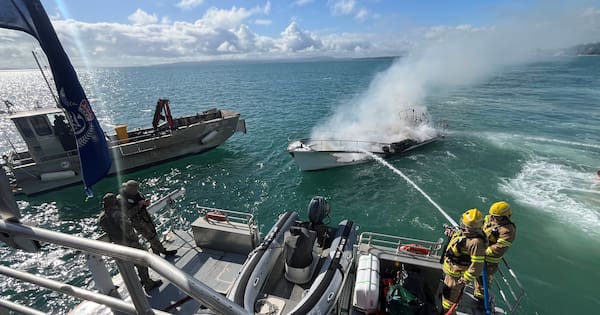 Pleasure launch destroyed by fire on Hauraki Gulf, two rescued