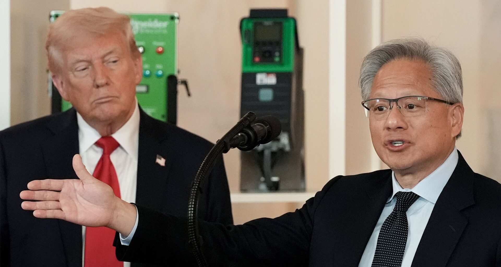 Donald Trump and Jensen Huang speaking at a press conference.