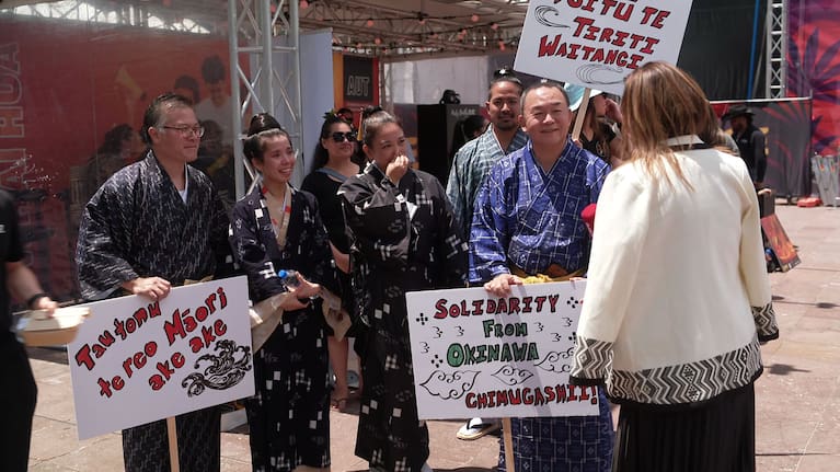 Eric Wada (in blue) and the delegation from Okinawa.