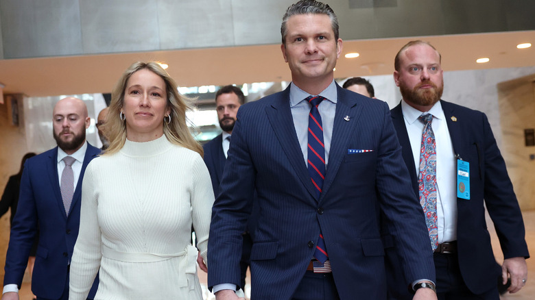 Pete Hegseth and wife Jennifer Rauchet arrive for a meeting at the Hart Senate Office Building on January 8, 2025 in Washington, DC.