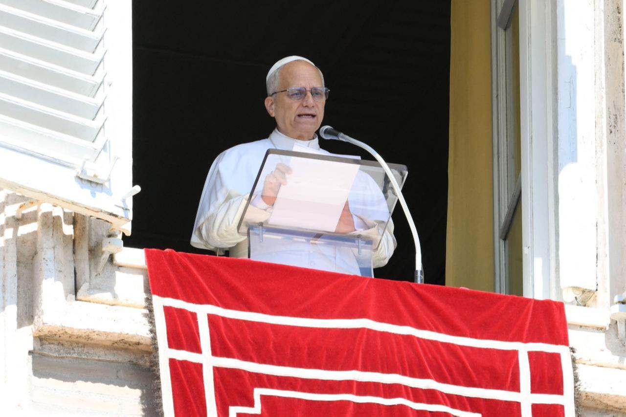Pope Leo XIV addressing crowd from window of the apostolic palace overlooking St. Peters square during the Angelus prayer in The Vatican on Sept. 21, 2025. (AFP Photo)
